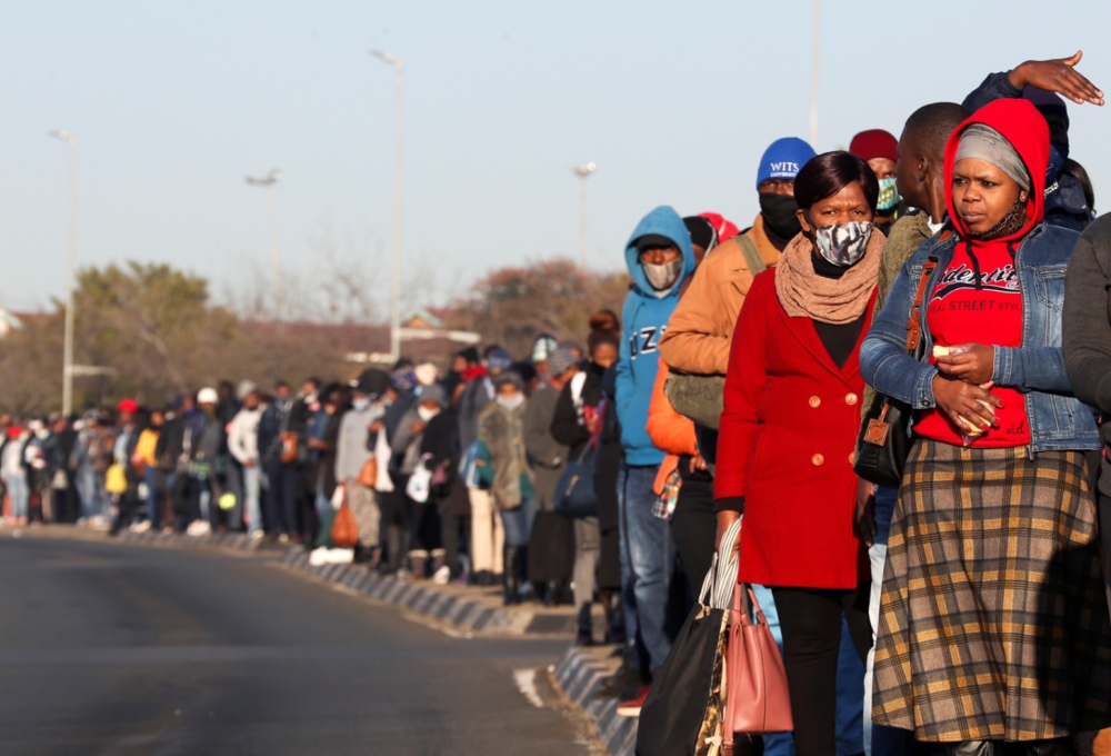 People queuing to receive grants 